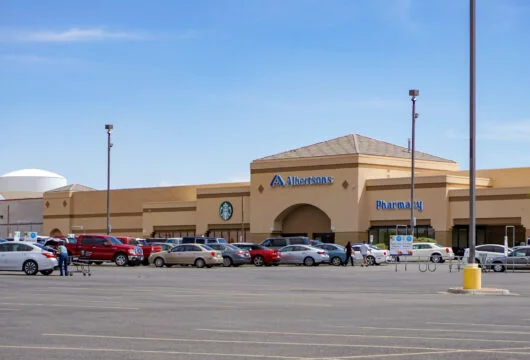 Exterior of an Albertsons store and parking lot