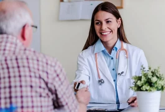 Medical professional taking a credit card payment from a patient