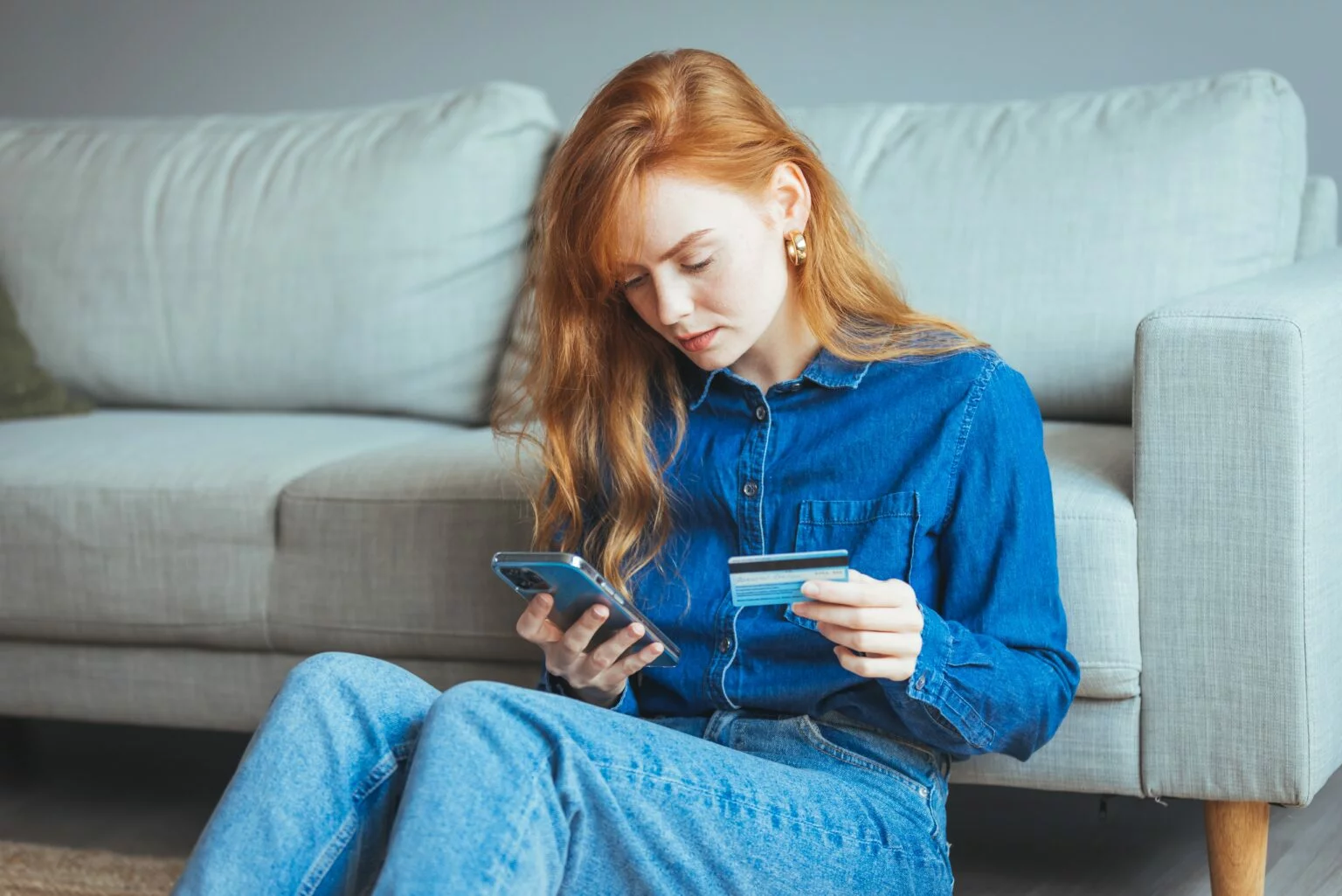 Woman checking her banking app for a direct deposit
