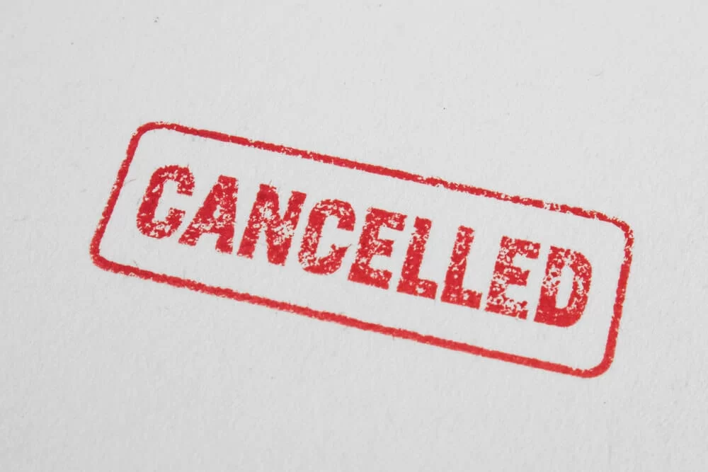 Red cancelled stamp on a document