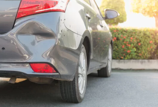 Rental car with a dent after a minor accident