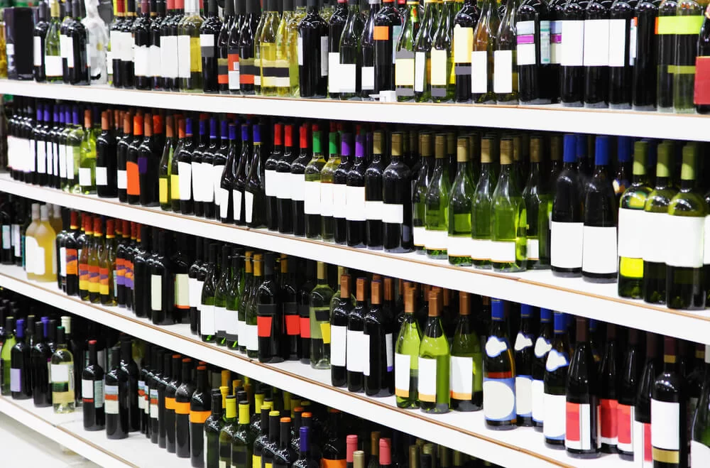 Wine bottles on shelves