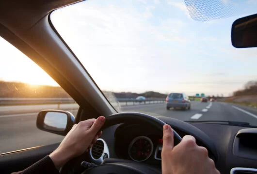 Person taking a rental car out of state on the highway
