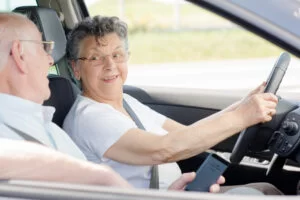 Elderly couple in a rental car
