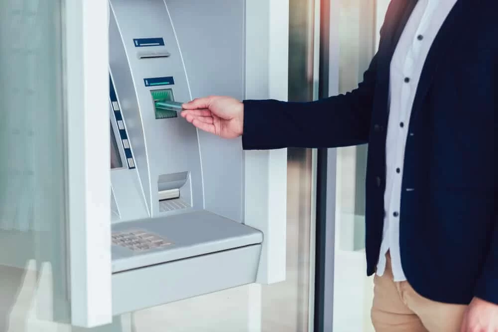 Man using an ATM