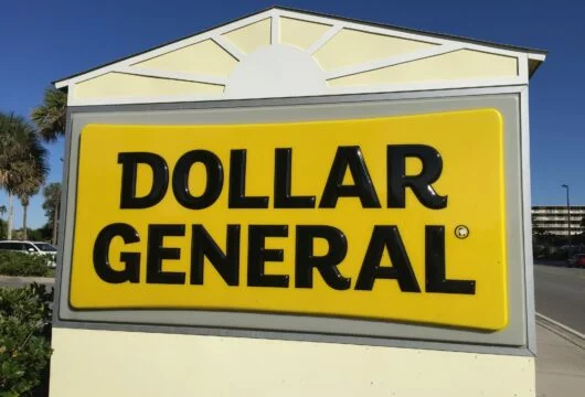 Yellow Dollar General logo sign outside of a store
