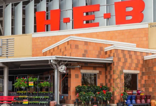 Exterior of an H-E-B store that offers cash back