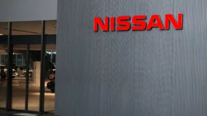 Nissan logo sign on the outside of a dealership