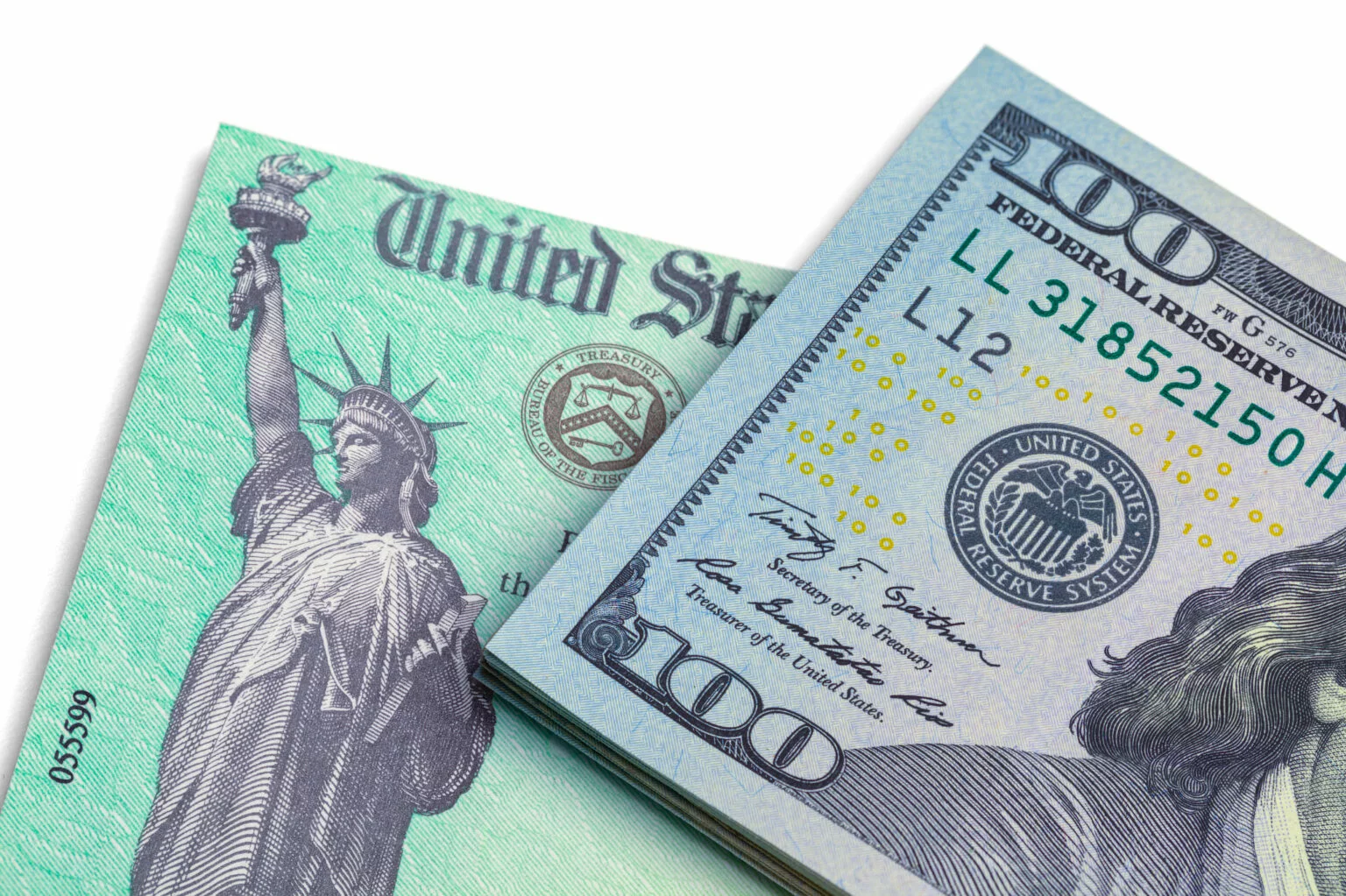 Government check and $100 bill