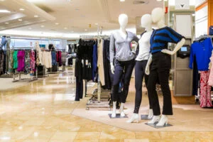 Mannequins in a clothing store that has a credit card with instant approval