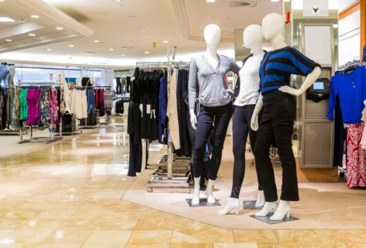 Mannequins in a clothing store that has a credit card with instant approval