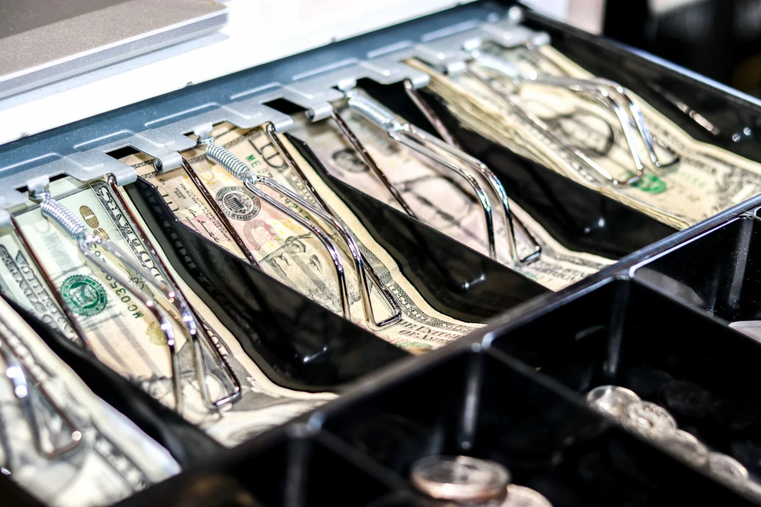 Cash register drawer at a store that gives cash back