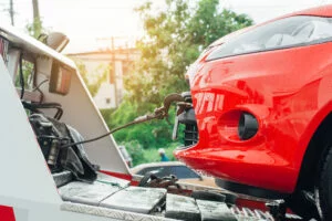 Car being towed during a repossession