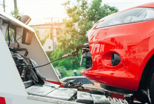 Car being towed during a repossession