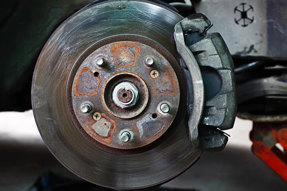An assembled disc brake on a car