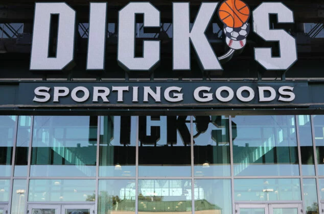Logo sign above the entrance of a DICK'S Sporting Goods store