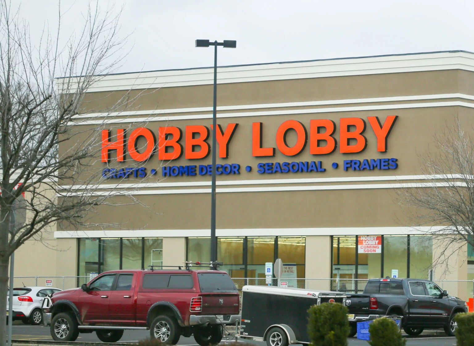 Exterior of a Hobby Lobby store and parking lot