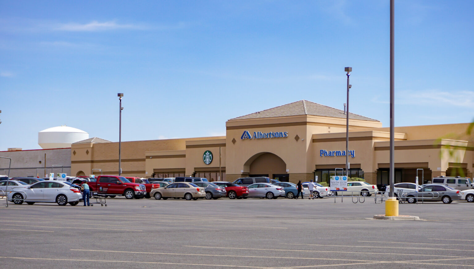Exterior of an Albertsons store and parking lot