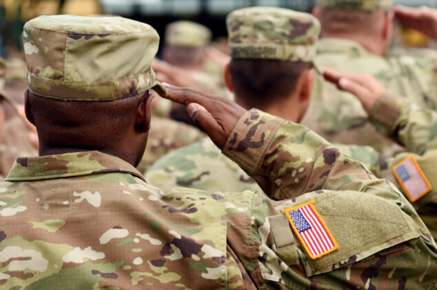 Active-duty military doing a salute while in uniform