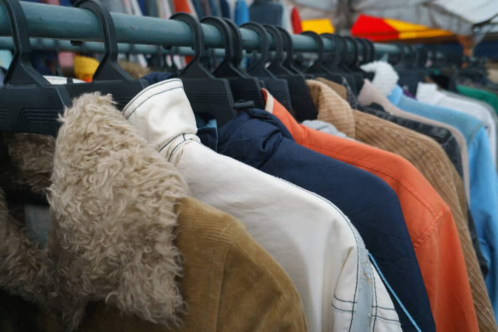 A rack of used clothing items