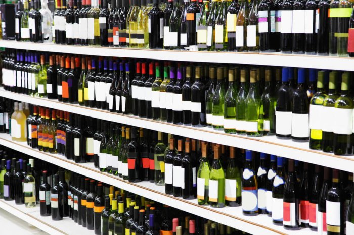 Wine bottles on shelves
