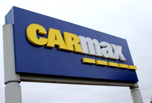 CarMax logo sign outside of a dealership location