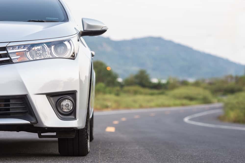 Turo rental car driving on a two-lane road