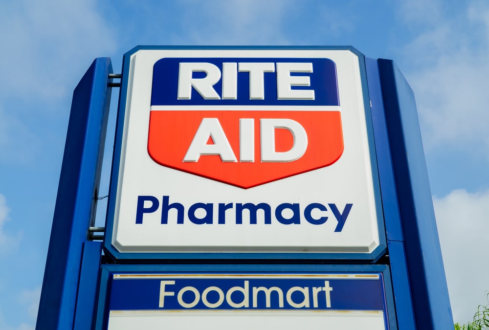 Logo sign outside of a Rite Aid store