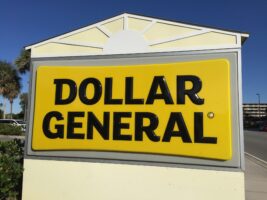 Yellow Dollar General logo sign outside of a store