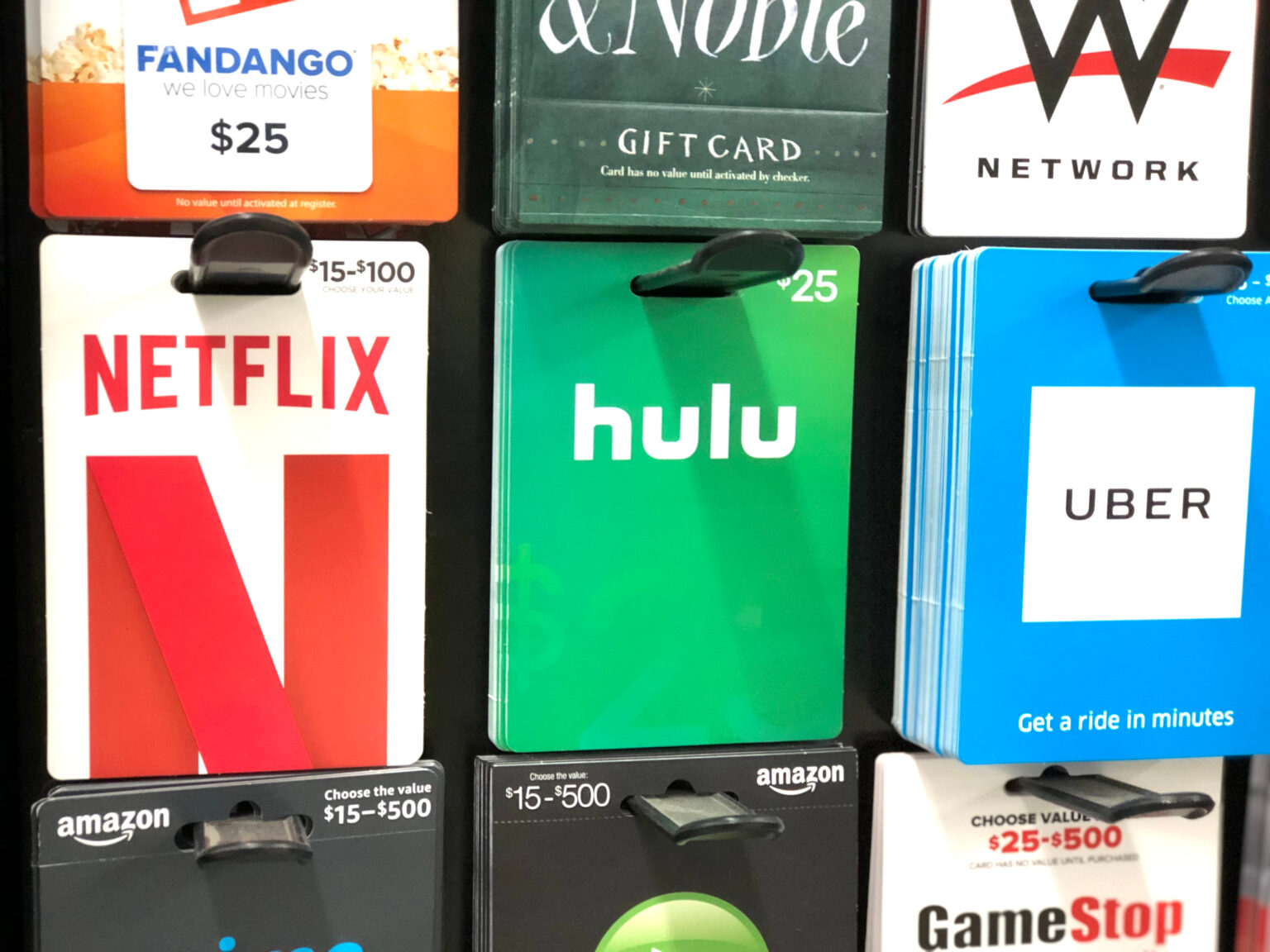 Selection of gift cards on display at a store like Stop & Shop