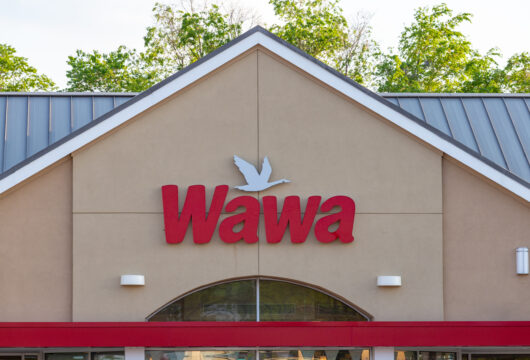 Wawa logo sign above the entrance to a store