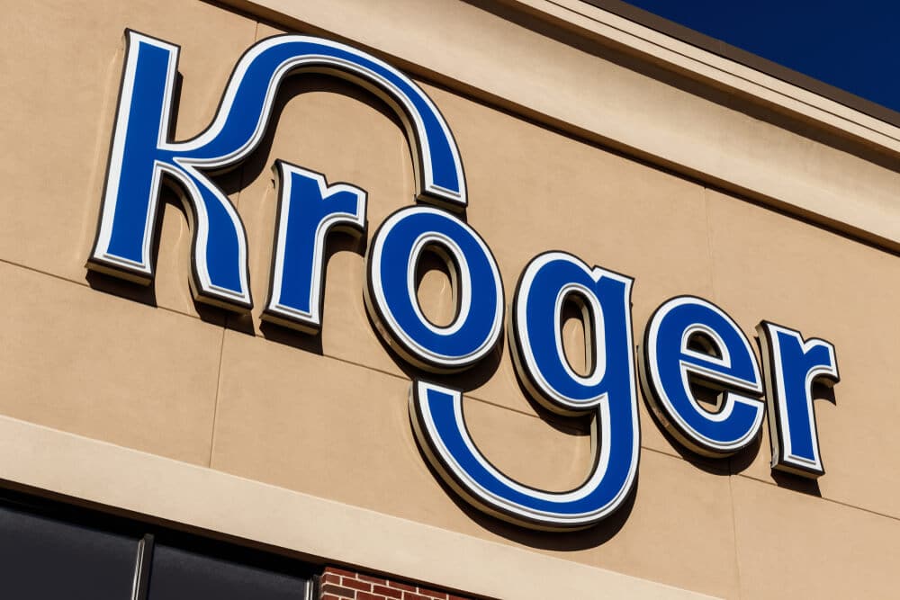 Blue logo sign on Kroger storefront