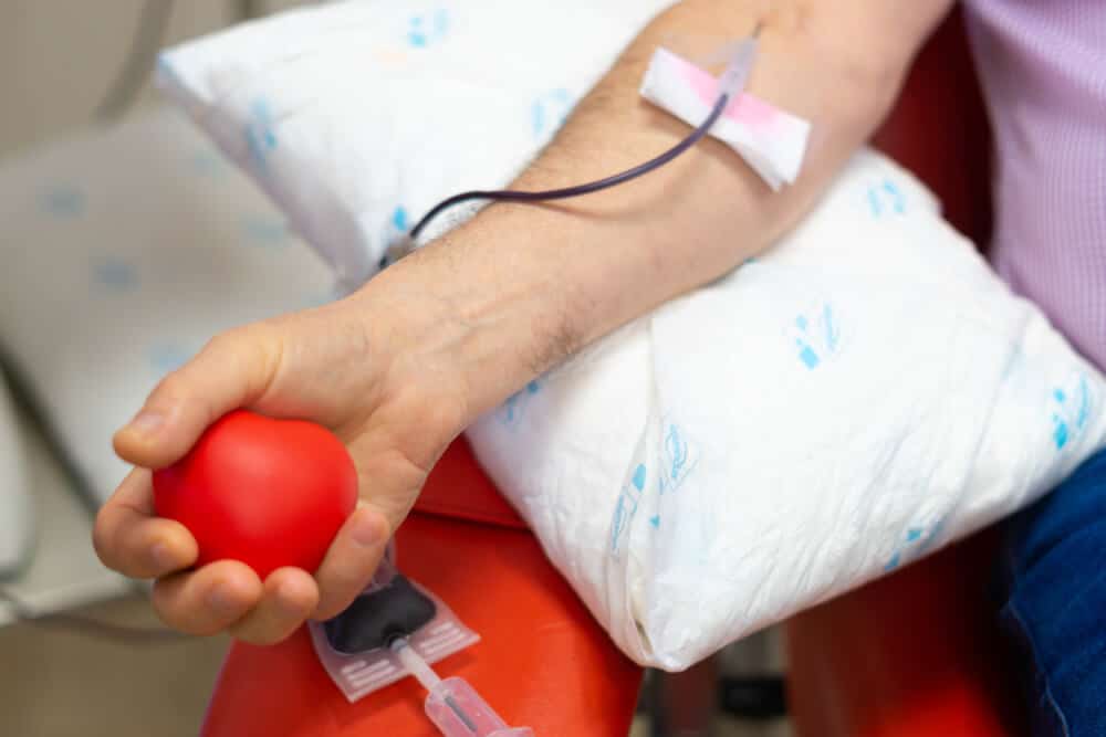 Arm of a plasma donor during the donation process