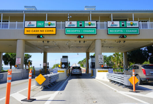 Rental car passing through a toll plaza in Florida