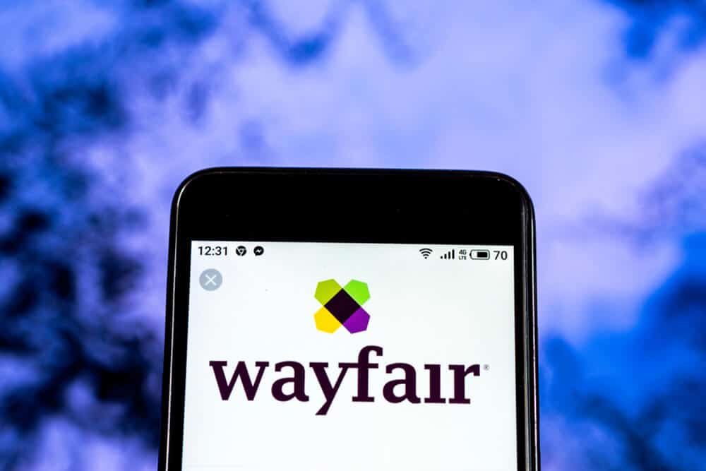 Cell phone with Wayfair logo on the screen