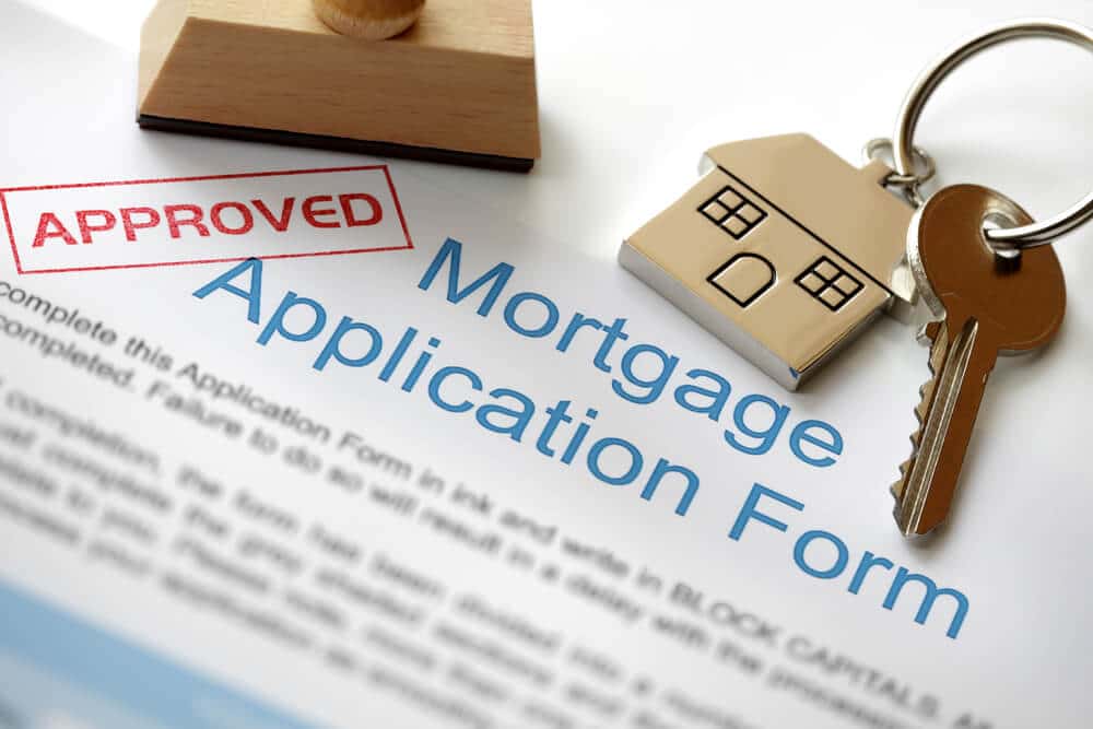 A manually underwritten loan application form.