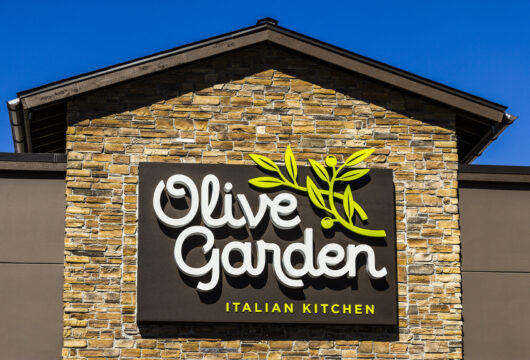 Olive Garden logo sign above the entrance to the restaurant