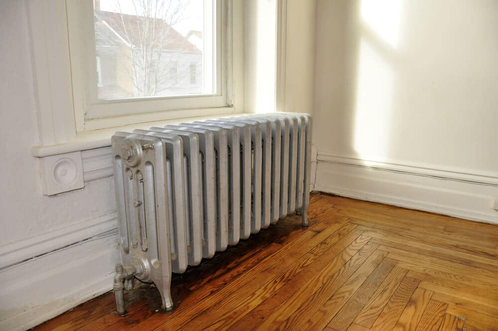 Old radiator in an empty house