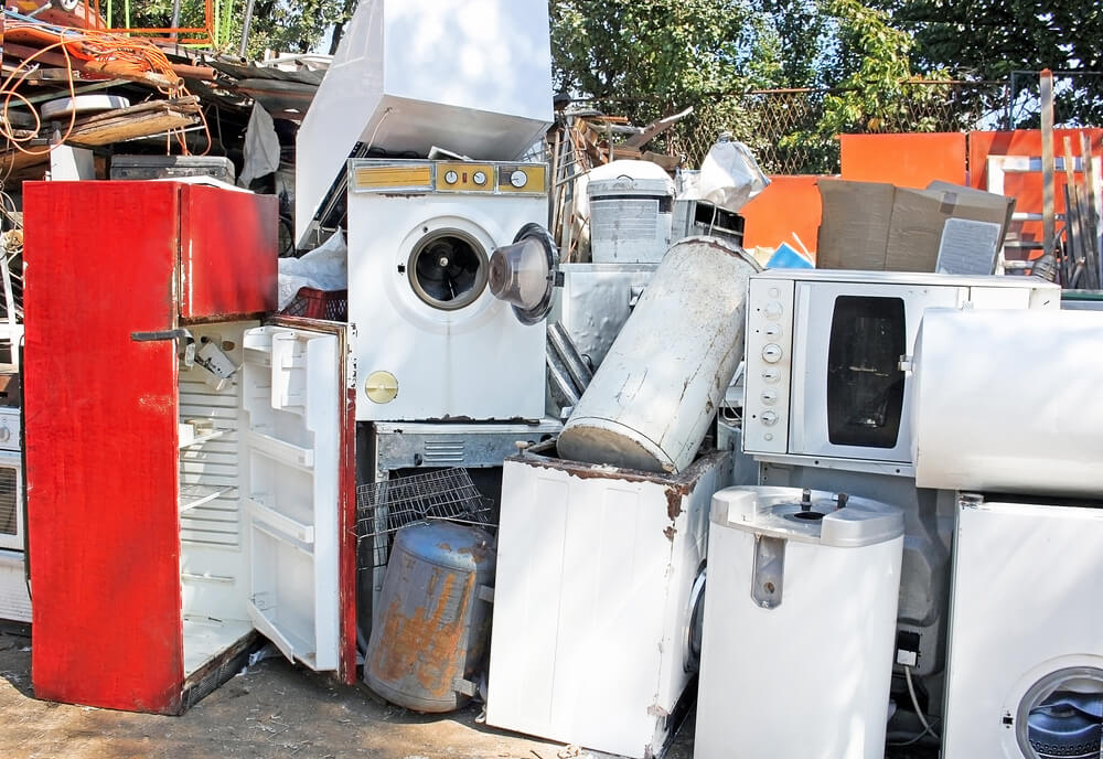 Pile of old, broken scrap appliances