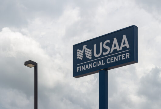 USAA Financial Center sign against a cloudy sky
