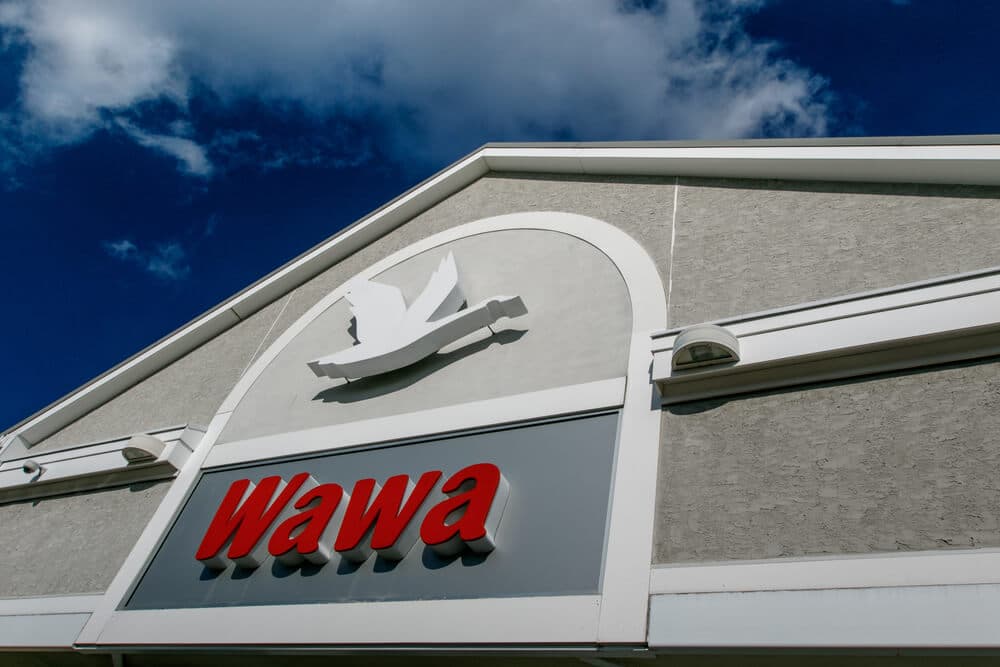 Sign above the front entrance of a Wawa store