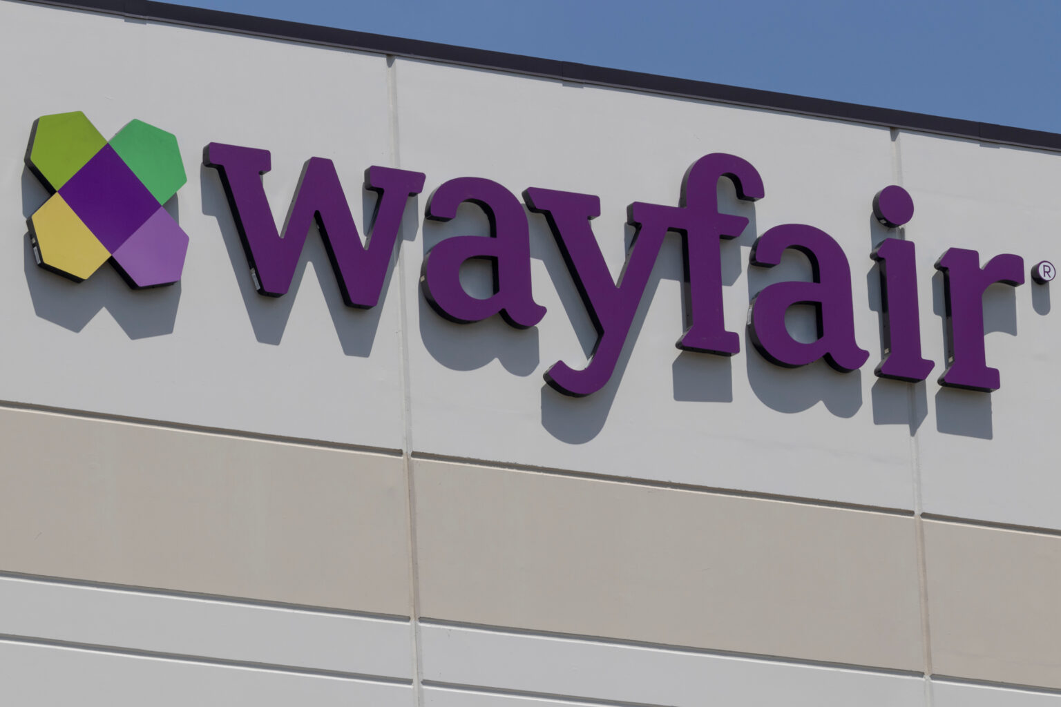 Wayfair logo sign on the exterior of its offices