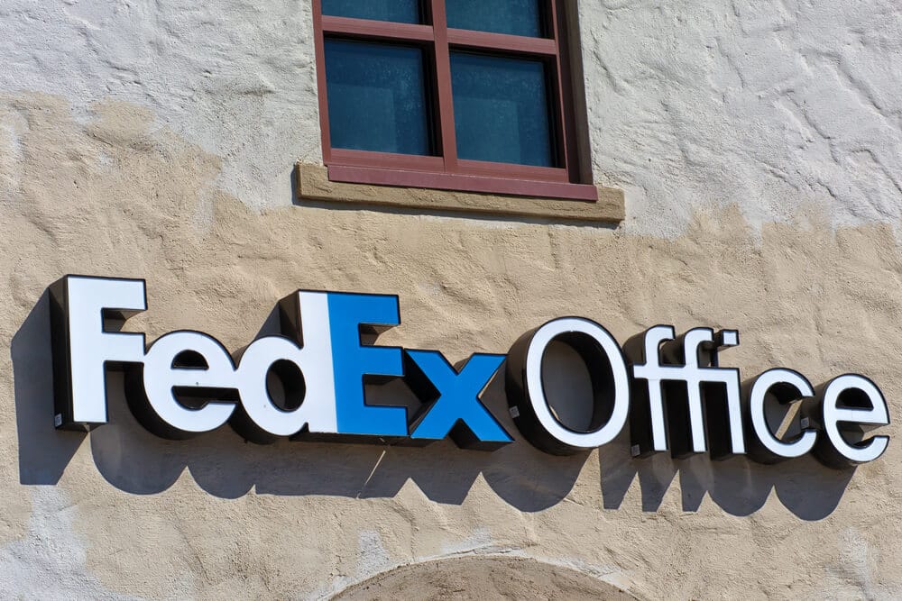 Image of the outside of a FedEx Office location that burns CDs.