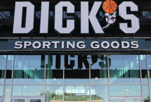 Logo sign above the entrance of a DICK'S Sporting Goods store