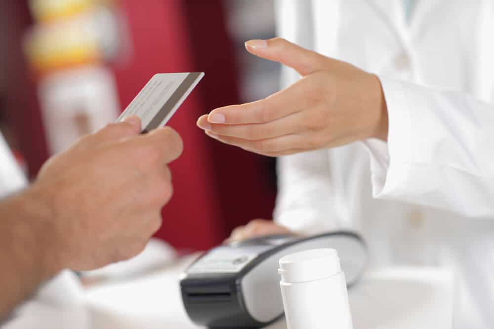 customer making an FSA card purchase at a pharmacy