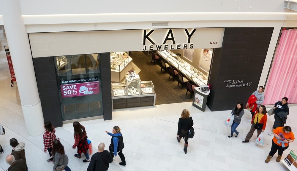 Shoppers enter a Kay Jewelers store in a mall