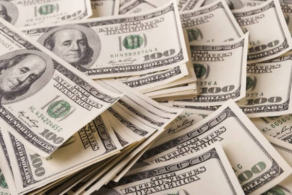 a pile of 100-dollar bills
