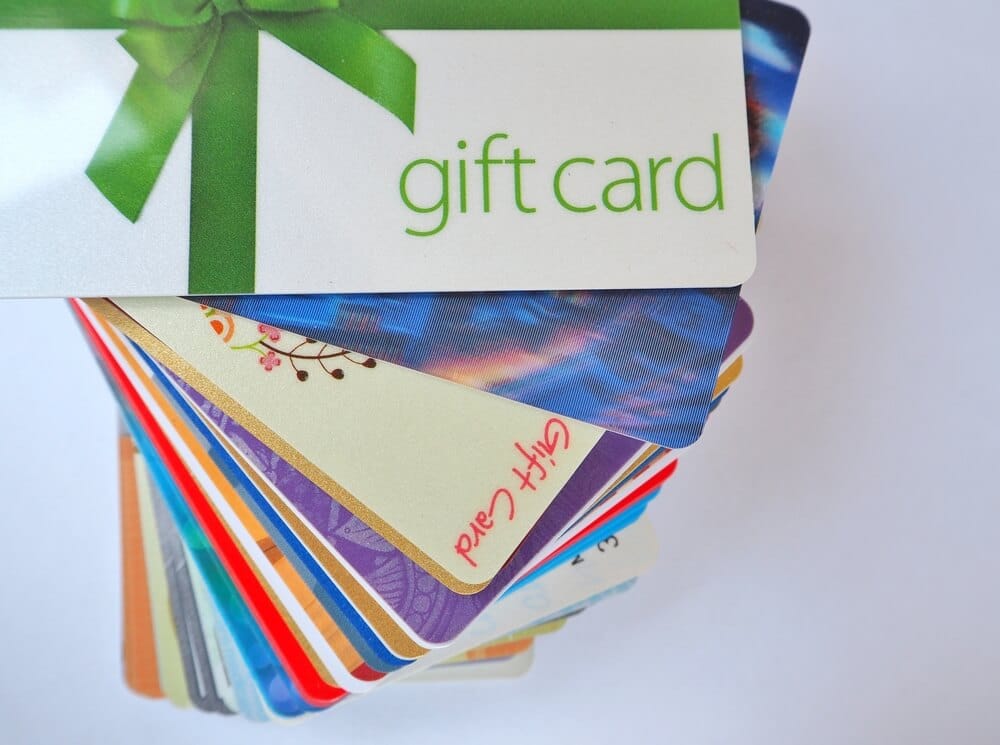 pile of gift cards for different stores